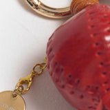 Charm de piel granada rojo